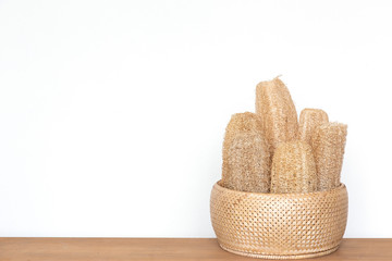 luffa sponge on wood table.