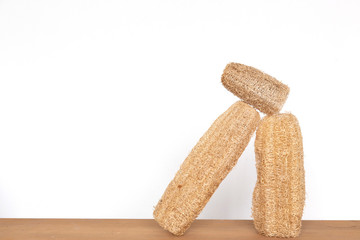 luffa sponge on wood table.