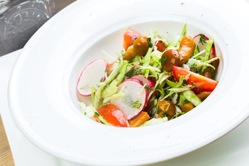 A fresh bowl of homemade coleslaw with dressing
