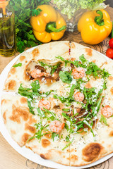 Traditional Italian pizza, vegetables, ingredients. Pizza is cooking in the oven. Pizza menu