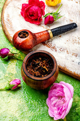 Smoking pipe and floral tobacco