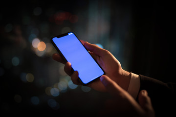 People holding mobile phones