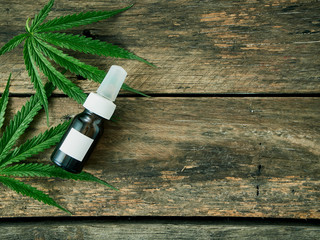 Cannabis with extract oil in a bottle