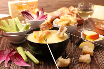 cheese fondue with fruit and vegetable