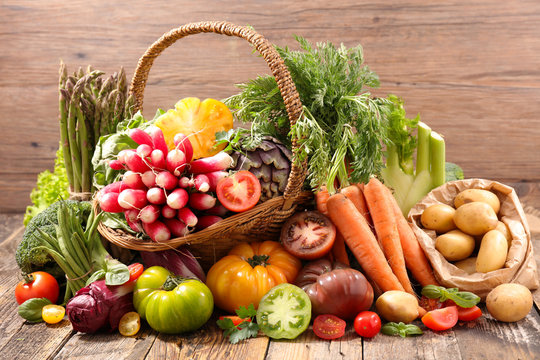 selection of fruit and vegetable on wood background
