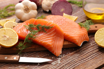 salmon with herb and lemon on board