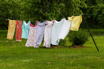 Countryside outdoor park view of drying clothes in a wind.