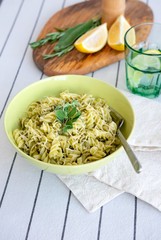 Pasta with pesto and lemon  selective focus on pasta