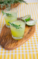 Fresh Cocktail With Rosemary And Melting Ice