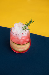 Cocktail With Rosemary And Melting Ice