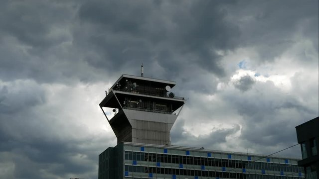 Telecommunications tower in Prague (CETIN) and storm clouds rolling behind it in a timelapse