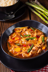 colorful turkey fricassee with asparagus and paprika