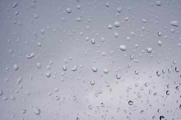 Drops of rain on glass