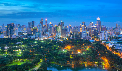 Fototapeta na wymiar Evening cityscape at Lumpini park from at Bangkok , Thailand.