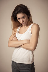 Obraz premium Human expressions and emotions. Desperate young attractive woman with angry face looking furious