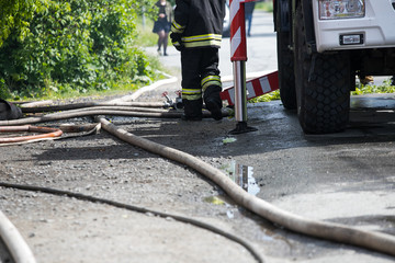 firefighters extinguish the fire house