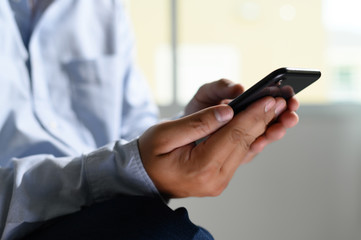 Close-up Young man with smartphone work and talking on the phone