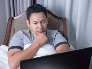 Man Watching Online Movie Streaming on Laptop