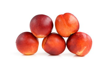 Fresh nectarines isolated on white