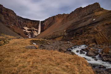  Iceland natural landscape in winter with snowy mountains and a nice river.