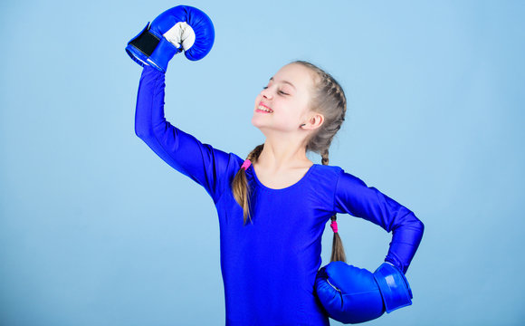 With Great Power Comes Great Responsibility. Boxer Child In Boxing Gloves. Rise Of Women Boxers. Female Boxer Change Attitudes Within Sport. Free And Confident. Girl Cute Boxer On Blue Background