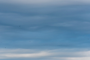 Cloudscape of Overcast Sky with Layers of Clouds in Blues and Grays
