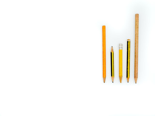 Group of lined up pencils isolated on a white background. Concept back to school