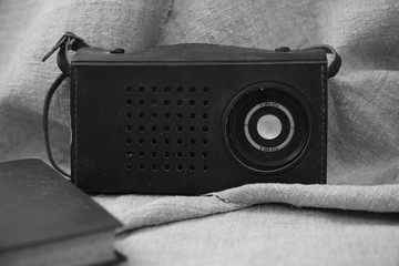 old soviet tape recorder on a flax texture background