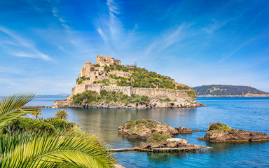 Aragonese Castle located in sea near Ischia island, Italy.