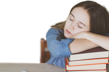 Stressed college student tired of hard learning with books in exams tests preparation, overwhelmed high school teen girl exhausted with difficult studies or too much homework, cram concept. 