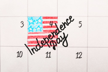 Calendar with marked date of Independence Day, closeup