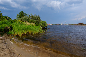 storm clouds forming over green meadow pastures