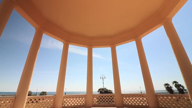 Circular gazebo temple of music near the Mascagni terrace. Interior view with columns framing the sea and the sky.