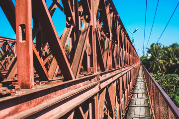 Old Red Steel bridge with blue sky