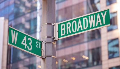 Broadway and W43 corner. Green color street signs, Manhattan New York downtown