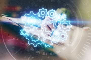 International business hud over woman's hands writing background. Concept of hard work. Double...