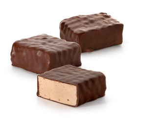 Candies whipped Cream in chocolate on a white background