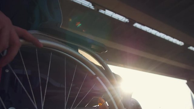Close up of a disabled person who uses a wheelchair