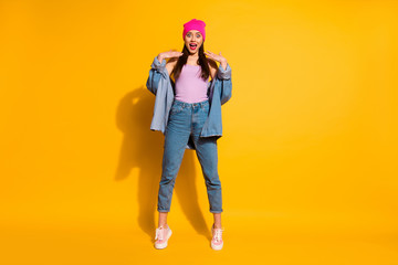 Full length body size view photo of charming lady astonished impressed incredible novelty scream she shout feel rejoice enjoy wear sneakers fashionable clothing isolated yellow background