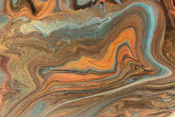 Brown and gold marbling pattern. Golden marble liquid texture.