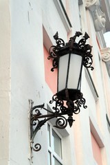 Old street lamp. Cityscape.