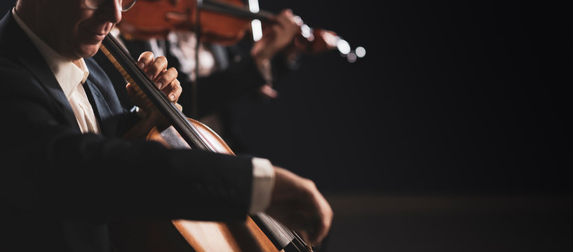 Symphonic Orchestra Performing On Stage