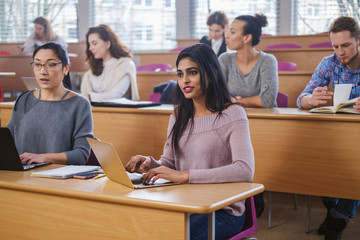 Multinational group of students in an auditorium