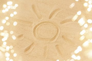 summer vacation concept - picture of sun in sand on beach