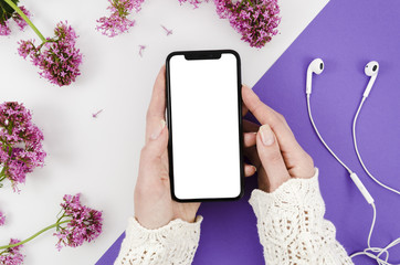 Top view smartphone template over workspace