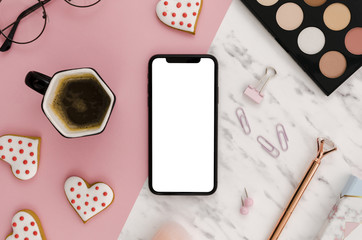 Top view smartphone template over workspace