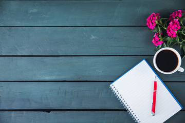 notepad with flowers and coffee