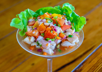 Ceviche in martini glass with lettuce garnish 