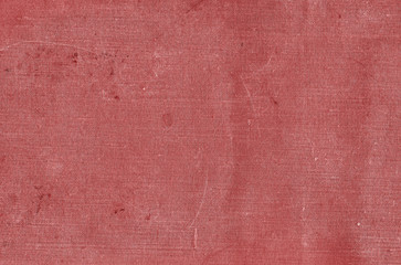Fototapeta premium Old grungy canvas pattern with dirty spots in red color.