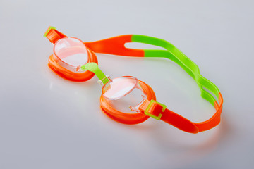 Professional glasses for swimming isolated on a white background. Kid's pool goggles.